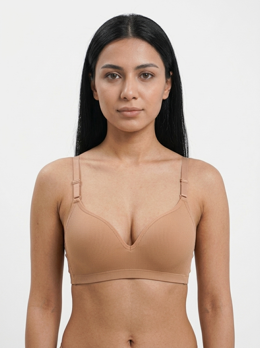 Arab_woman_wearing_beige_bra_202607180226 Women's Wire-Free Ribbed Comfort Plunge Bra - Image 1