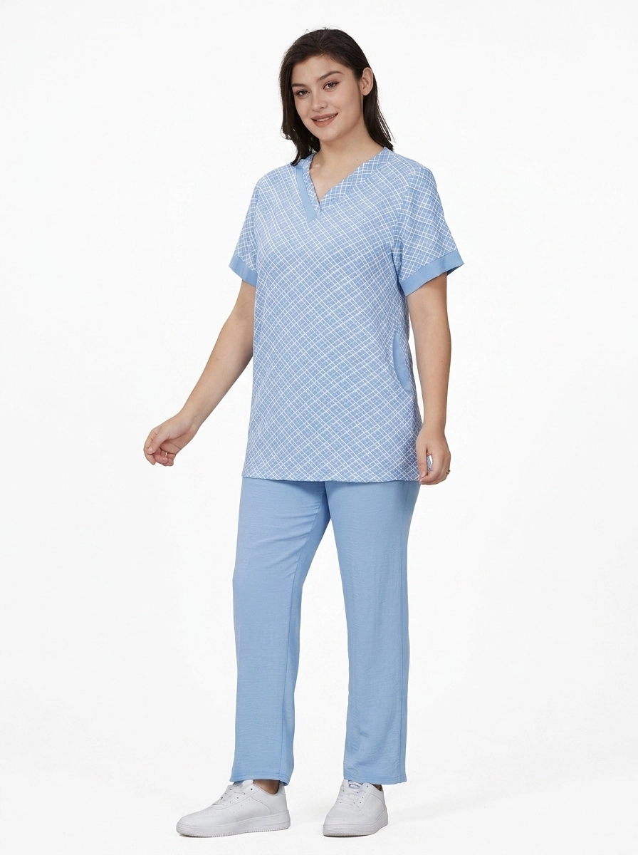 Female_model_wearing_healthcare_…_202607131033 (1) Grid Plaid Print Professional Uniform Scrub Set - Image 1
