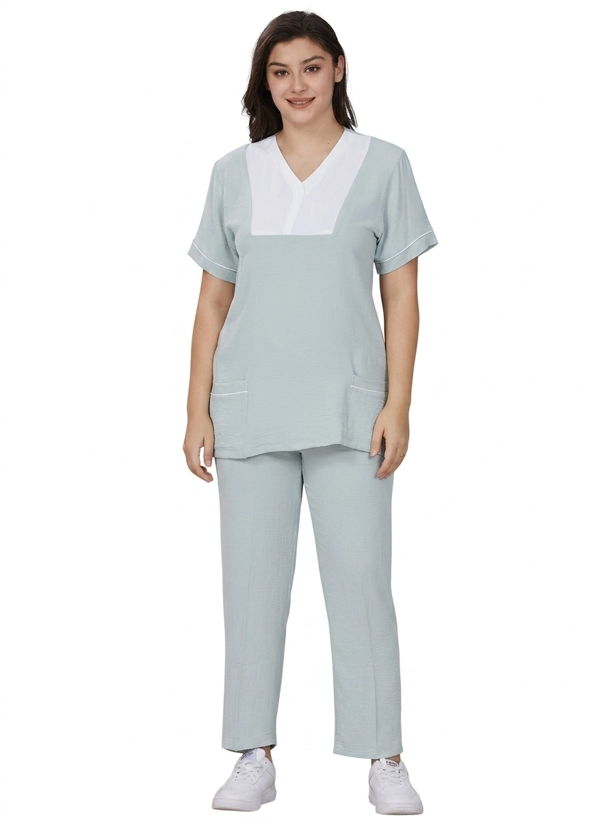 Female_model_wearing_scrubs_202607130948 V-Neck Professional Uniform Scrub Set - Image 1