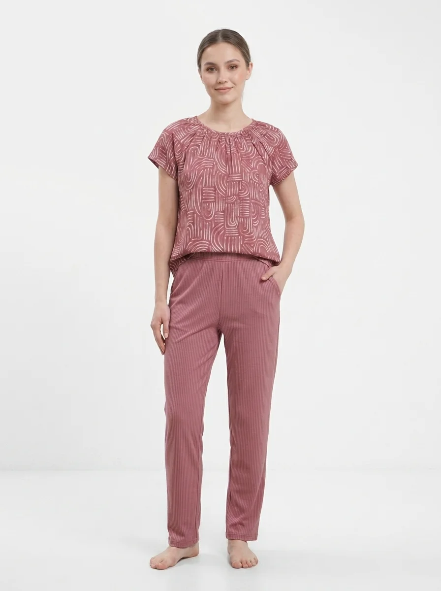 Model_wearing_blouse_and_pants_202608290419 Women's Geometric Arch Print Ruched Neck Pajama Set - Image 1