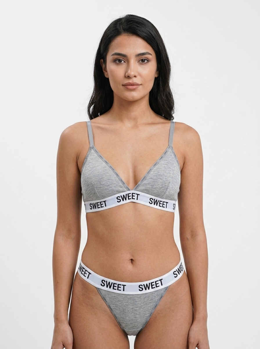 Model_wearing_gray_lingerie_set_202607160341 (1) Seamless Typographic Active Lingerie Set - Image 1