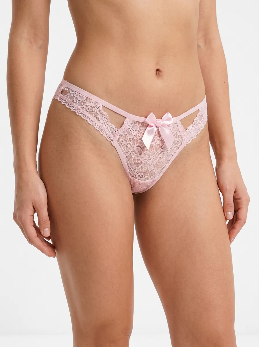 Model_wearing_pink_lingerie_202607190644 Premium Floral Lace Open-Front G-String Thong with Ruffled Trim & Faux Pearl Tassel - Image 1