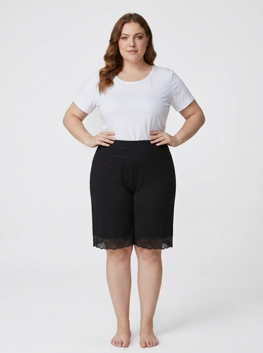 Woman_in_black_shorts_202607101917 (1) Women's Plus Size Lace-Trim Lycra Lounge Shorts - Image 1