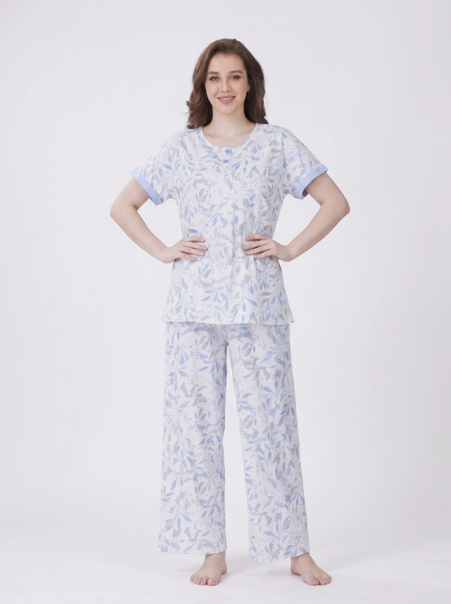 Woman_in_floral_pajama_set_202607101906 (1) Women's All-Over Leaf Print Short-Sleeve Pajama Set - Image 1