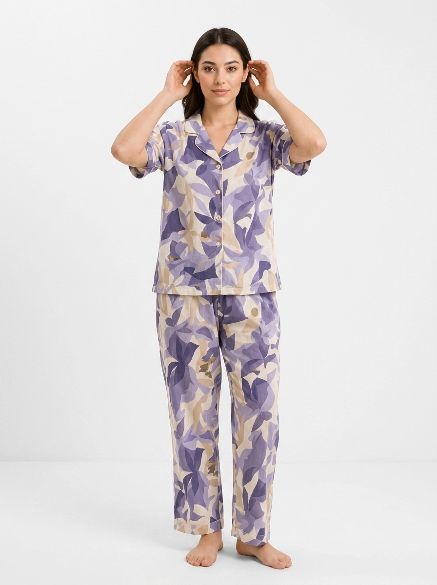 Woman_in_floral_pajamas_202607101805 Women's Floral Leaf Purple Pajama Set - Image 1