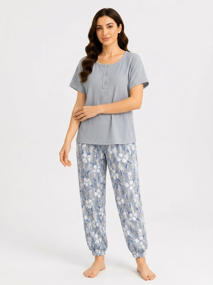 Woman_wearing_blue_top_floral_202607150645 (1) Serene Sky Meadow Henley Loungewear Set - Image 1
