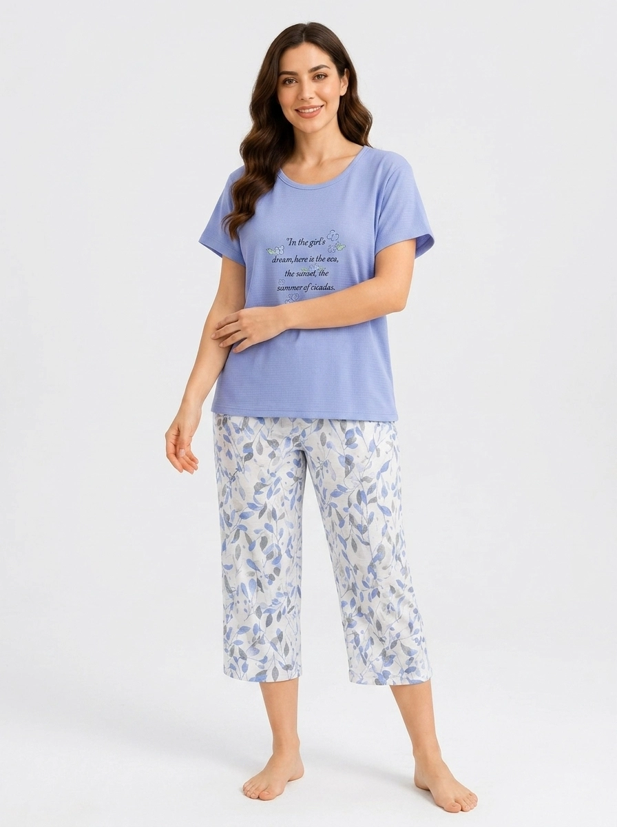 Woman_wearing_floral_t-shirt_pants_202607150706 Peri Blue Dream Botanical Loungewear Set - Image 1