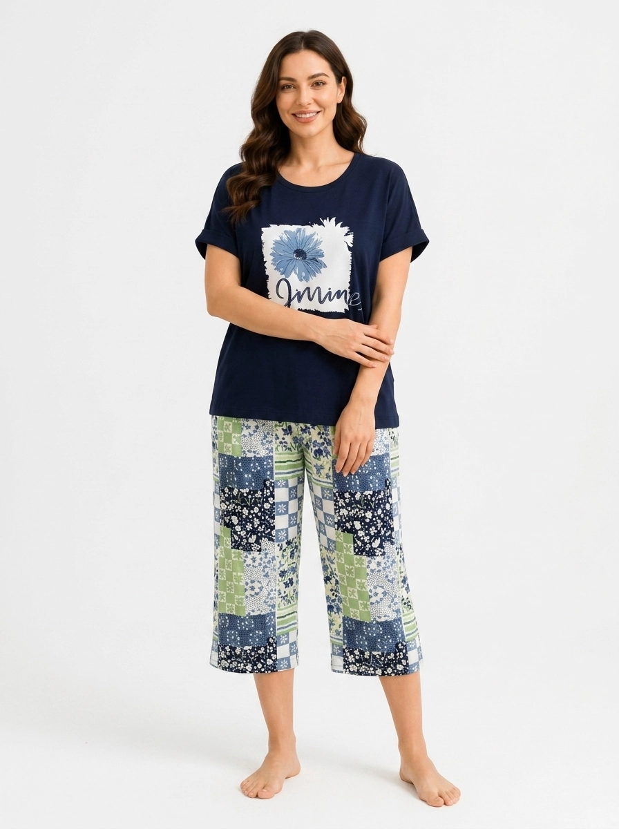 Woman_wearing_floral_t-shirt_pants_202607150714 (2) Midnight Navy Patchwork Botanical Loungewear Set - Image 1