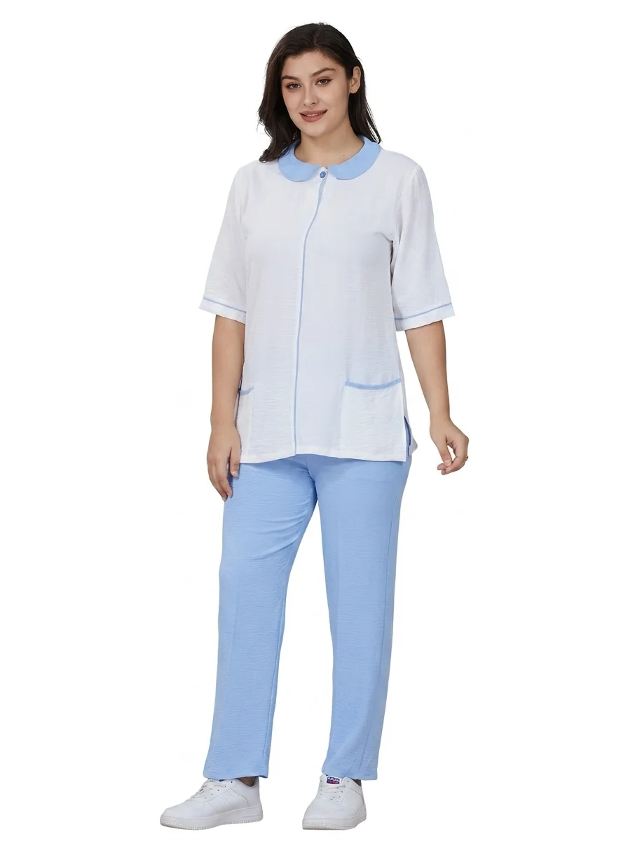 Woman_wearing_healthcare_uniform_202607091621 Classic Peter Pan Collar Uniform - Image 1