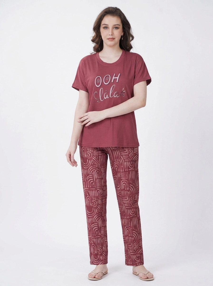 Woman_wearing_maroon_top_pants_202607150604 (2) Crimson Arch Abstract Loungewear Set - Image 1