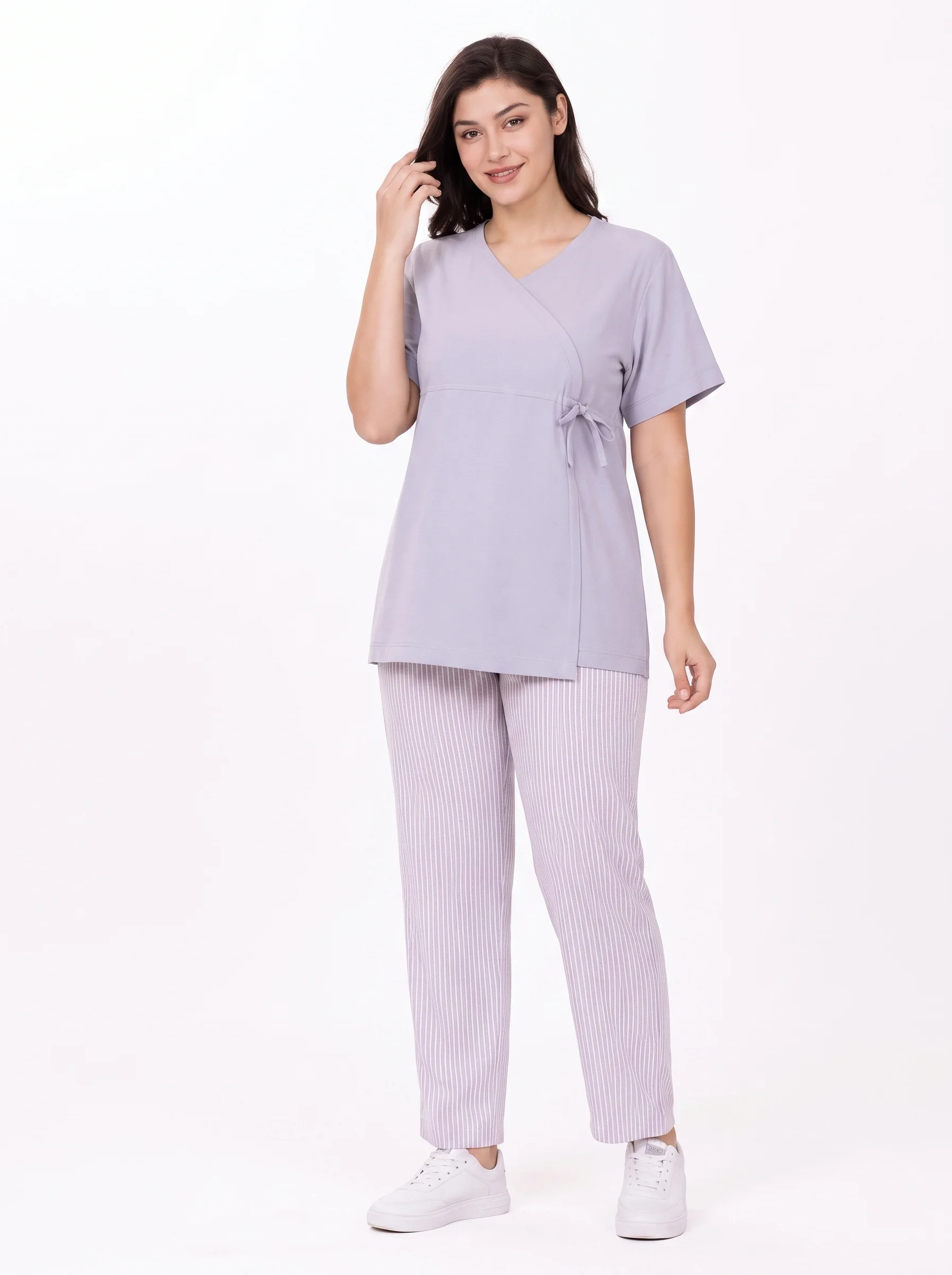 Woman_wearing_medical_uniform_2K_202607091551 Side-Tie Wrap Uniform - Image 1