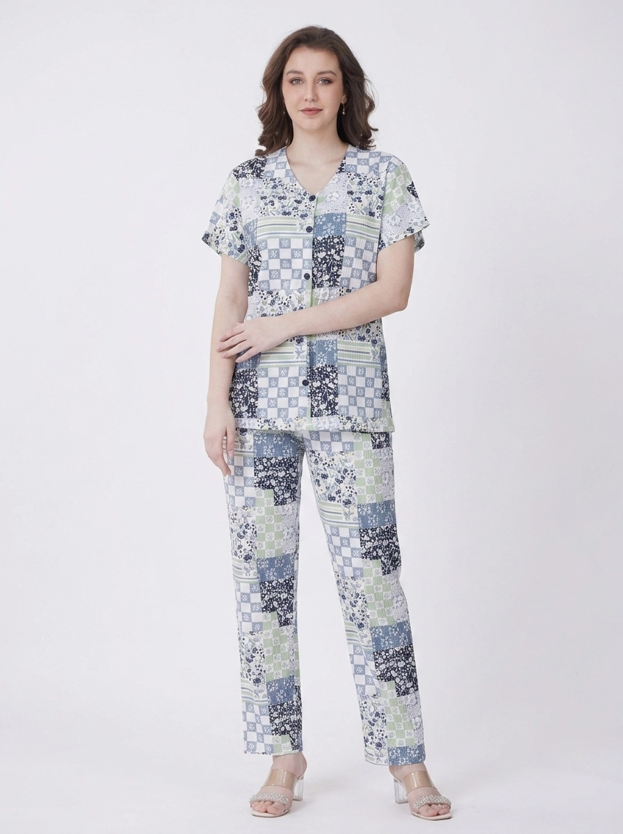 Woman_wearing_patchwork_pajama_set_202607150622 Sage & Slate Patchwork Botanical Loungewear Set - Image 1
