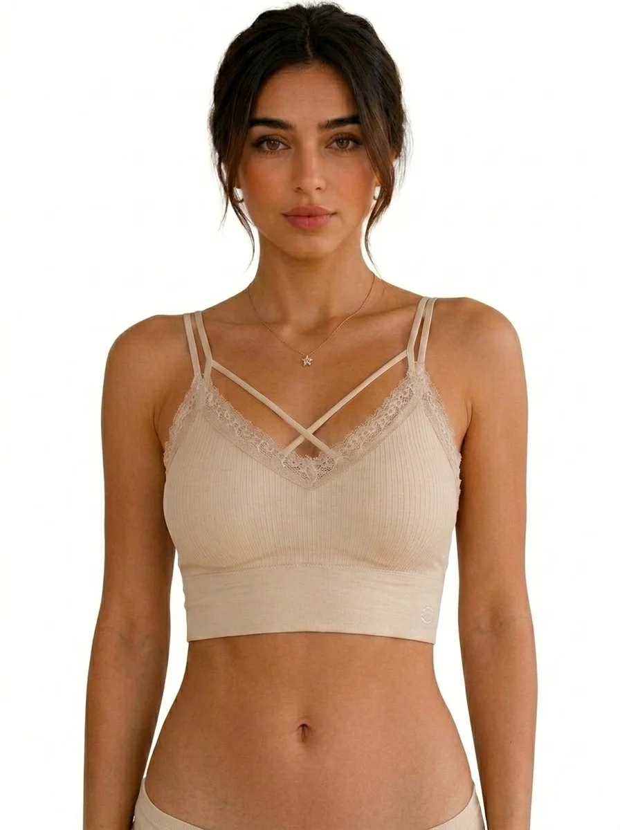 Model_posing_in_beige_garment_202608241337 (1) Premium Seamless Ribbed Cotton Bralette - Image 1