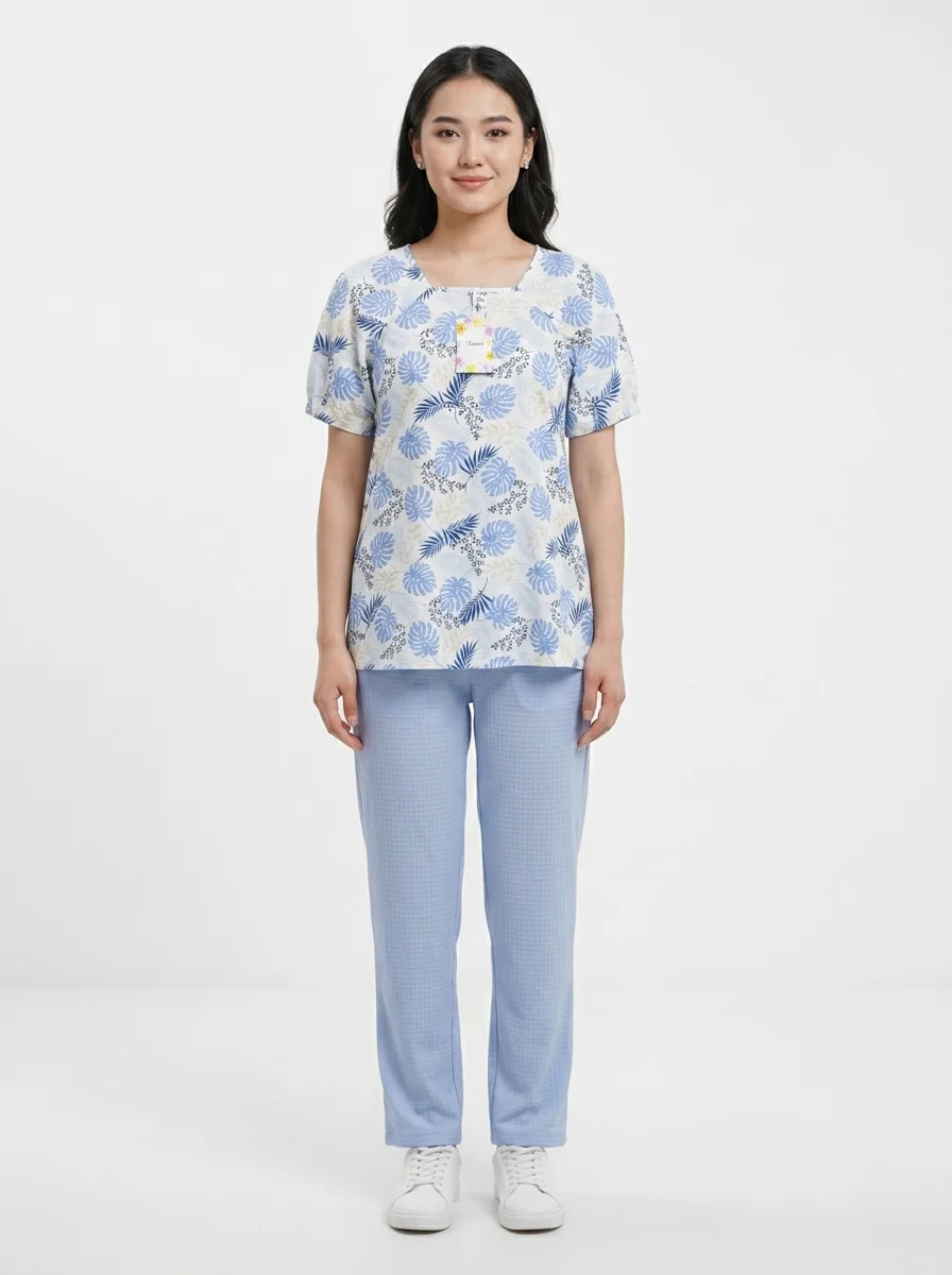 Model_posing_in_patterned_shirt_202608120202 Women's Botanical Print Loungewear Set - Image 1